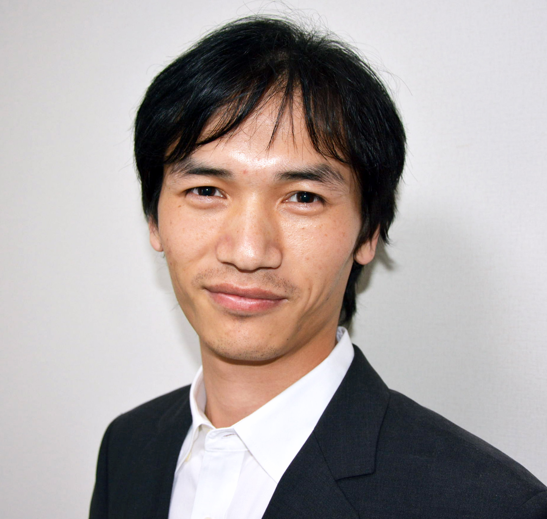 王 光輝